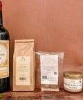 Coffret cadeau artisanal Hedona, épicerie fine et traiteur local à Trangé, regroupant spécialités régionales et gourmandises maison.